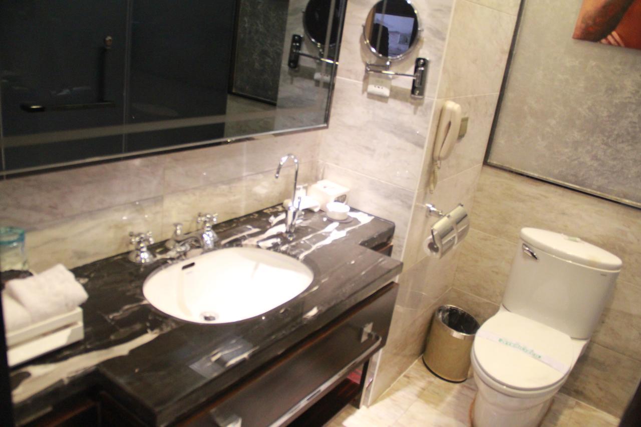 Huangjingang Holiday Hotel Jiexiu Habitación foto