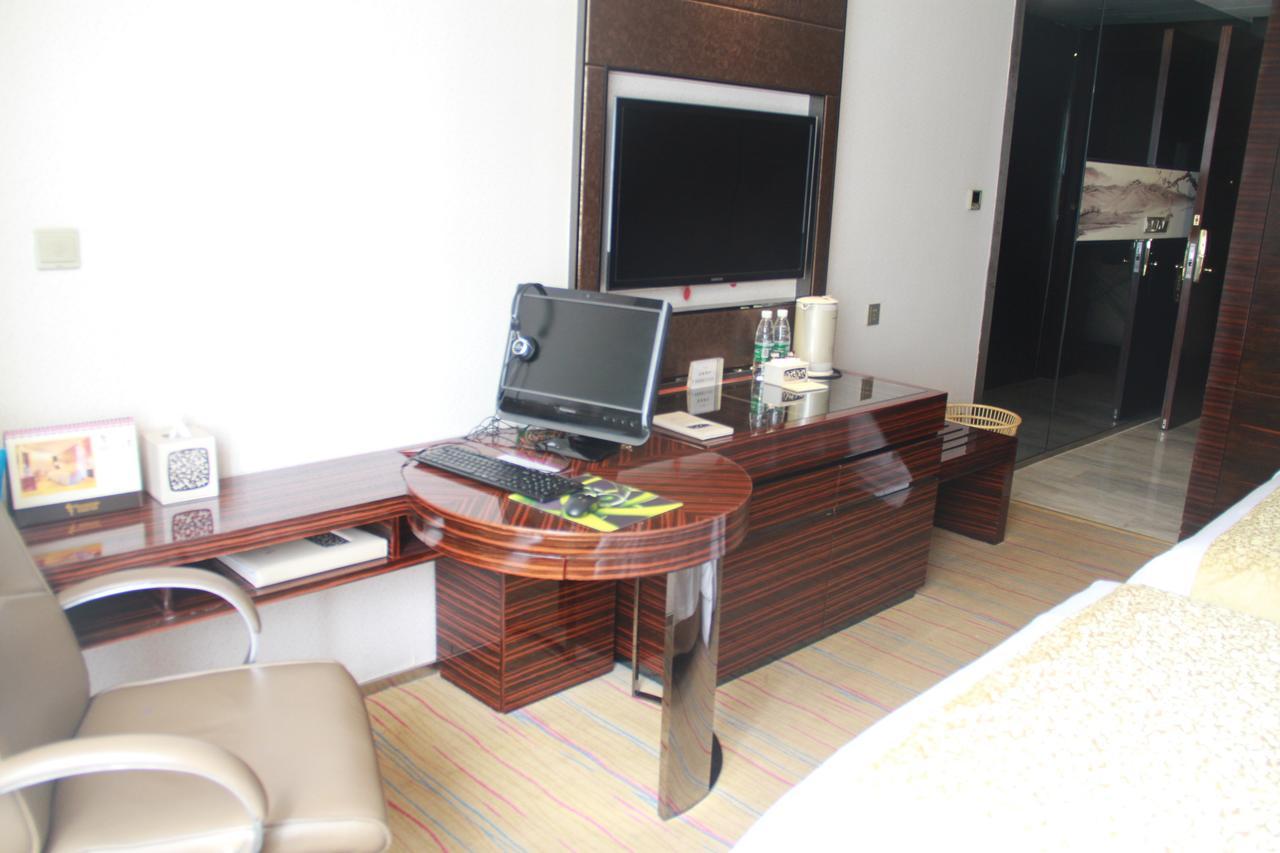 Huangjingang Holiday Hotel Jiexiu Habitación foto