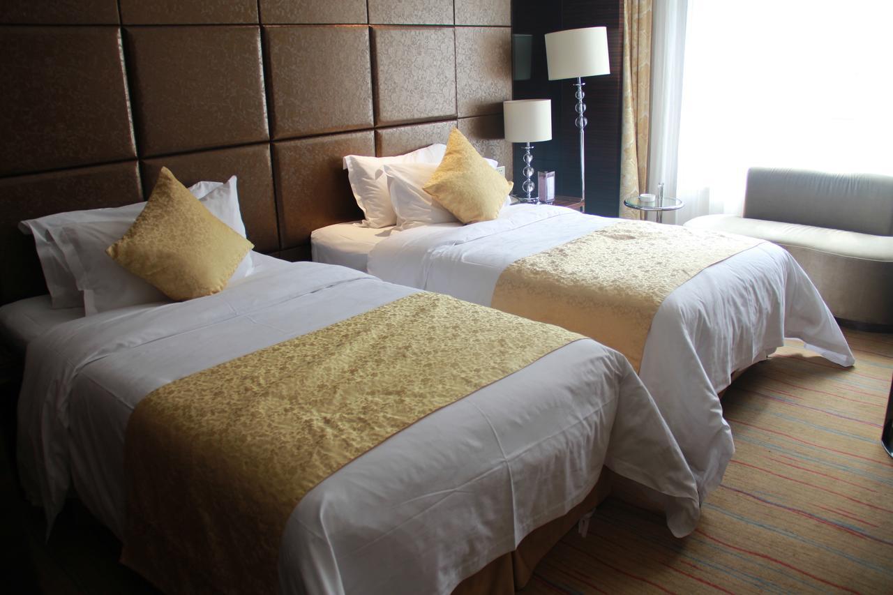 Huangjingang Holiday Hotel Jiexiu Habitación foto