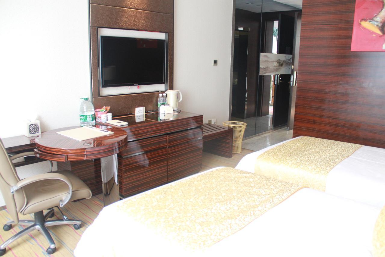 Huangjingang Holiday Hotel Jiexiu Habitación foto