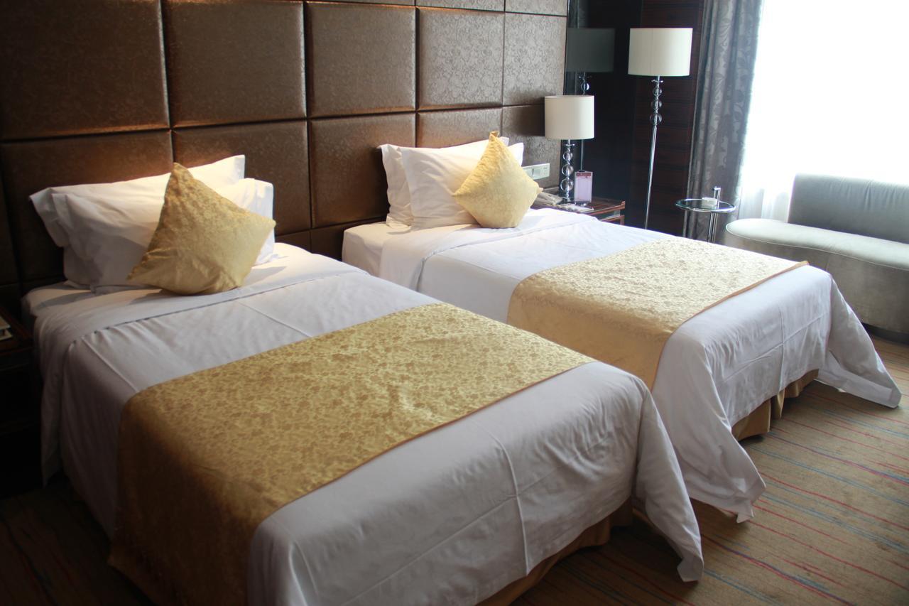 Huangjingang Holiday Hotel Jiexiu Habitación foto